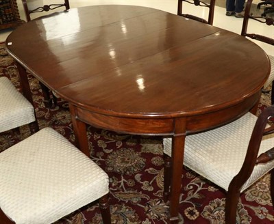Lot 1484 - A George III Mahogany D End Dining Table, early 19th century, with one additional leaf, on...