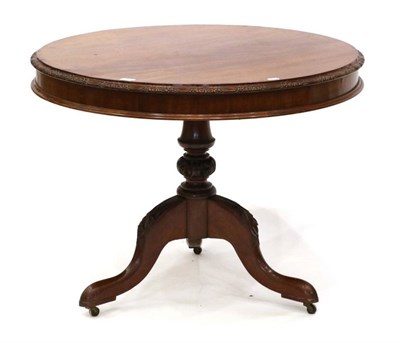 Lot 1485 - A George IV Carved Mahogany Fliptop Circular Breakfast Table, 2nd quarter 19th century,...