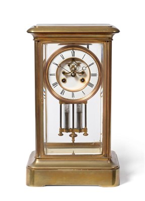 Lot 955 - A Large Brass Four Glass Striking Mantel Clock, circa 1890, four bevelled glass panels,...