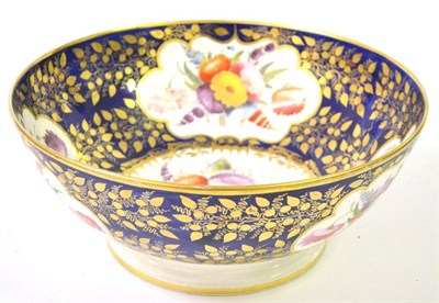 Lot 73 - A Staffordshire Porcelain Punch Bowl, circa 1820, painted with flower sprays in panels on a...