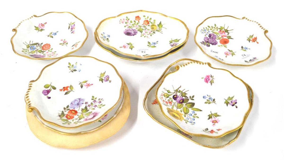 Lot 74 - An English Porcelain Dessert Service, circa 1820, painted with flower sprays and sprigs within gilt
