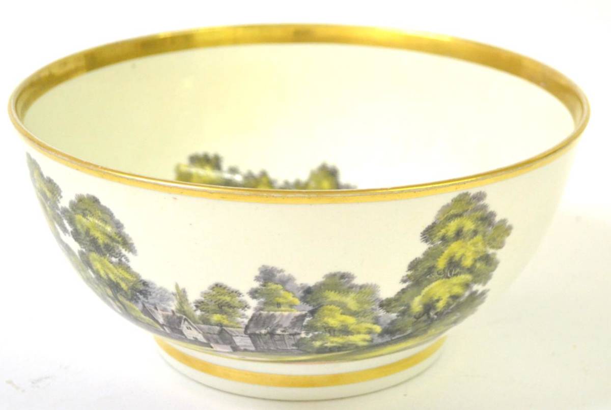 Lot 77 - A Staffordshire Porcelain Punch Bowl, circa 1820, painted with rural landscapes within gilt...