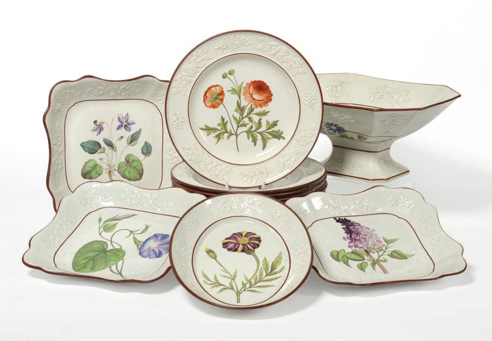 Lot 112 - A Pearlware Botanical Dessert Service, circa 1820, painted with named specimens within moulded...