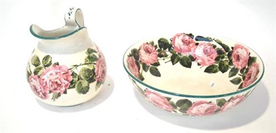 Lot 124 - A Wemyss Ware Jug and Bowl Set, early 20th century, painted with roses, printed, painted and...