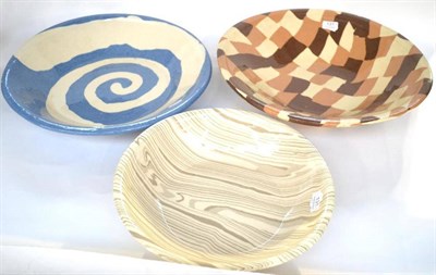 Lot 131 - Three Studio Pottery Dishes, in sizes, one with overall chequered design in shades of brown,...