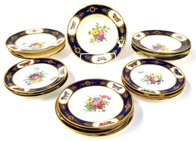 Lot 143 - A Set of Ten Sevres Style Dessert Plates, 19th century, painted with flower sprays, within blue...