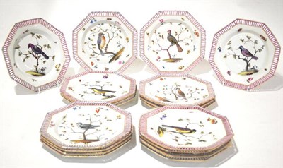 Lot 147 - A Set of Eighteen Meissen Style Porcelain Octagonal Dessert Plates, 19th century, painted with...