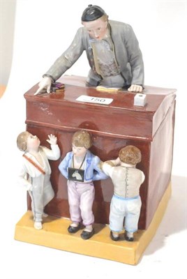 Lot 150 - A German Porcelain Box and Cover, circa 1900, as a teacher at his desk, three children below,...