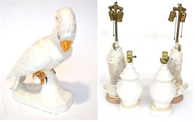 Lot 160 - A Nove Faience Model of a Parakeet, 20th century, painted marks, 41cm high; A Pair of White Pottery