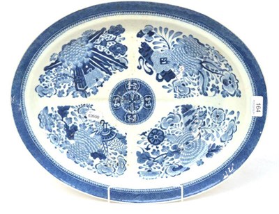 Lot 164 - A Chinese Porcelain Oval Meat Platter, circa 1800, with tree and gravy well, painted in...