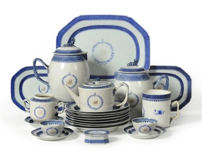 Lot 183 - A Chinese Porcelain Dinner Service, circa 1790, gilt with a monogram within underglaze blue wreaths