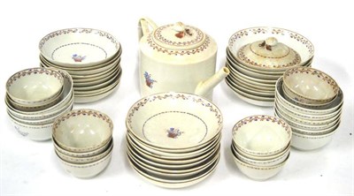 Lot 185 - A Chinese Porcelain Tea Service, circa 1790, painted with a basket of flowers within a floral...