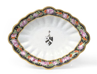 Lot 188 - A Chinese Armorial Porcelain Dessert Dish, circa 1815, of fluted oval form painted in colours...