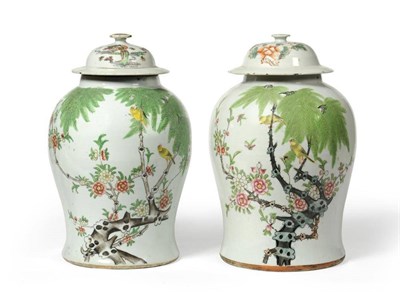 Lot 190 - A Pair of Chinese Porcelain Baluster Jars and Matched Covers, 19th century, painted in famille rose