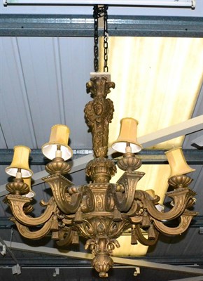 Lot 1029 - A Gilt Carved Wood and Gesso Nine-Light Chandelier, in 17th century style, the tricorn column...