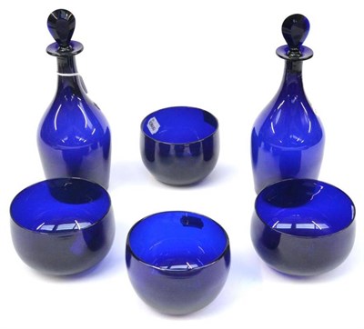Lot 194 - A Pair of Blue Glass Mallet Decanters and Stoppers, 19th century, 28cm high; and Four Similar...