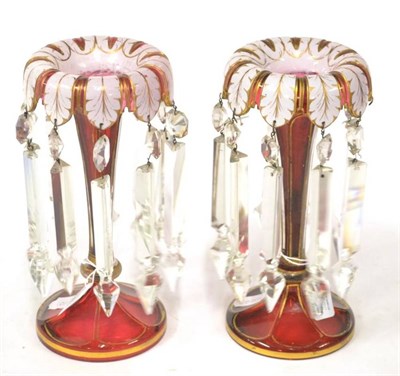 Lot 204 - A Pair of Bohemian White Overlay Ruby Glass Table Lustres, circa 1860, the bowls as stiff...