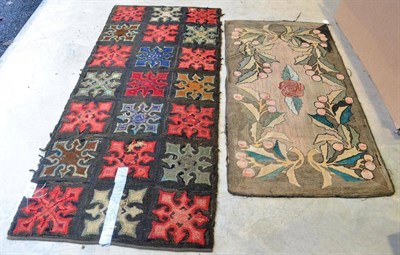 Lot 247 - American Looped Pile Rug The charcoal field with two columns of cruciform medallions, 202cm by...