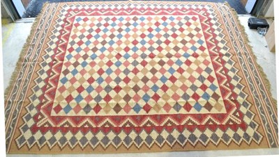 Lot 259 - Oriental Kilim The stepped lattice polychrome field enclosed by stepped reciprocal motif...