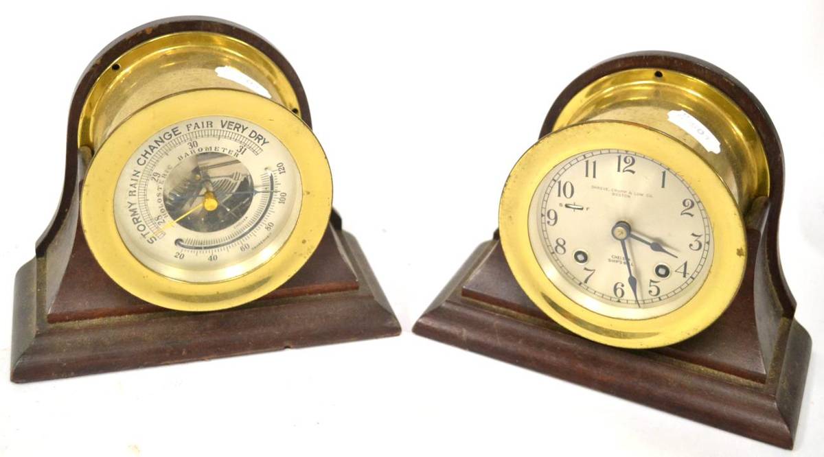 Lot 289 - An Aneroid Mantel Barometer, with a skeletonised centre, thermometer tube, 20.5cm wide; and A...