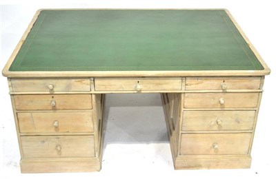 Lot 305 - A Victorian Washed Pine Partners' Desk, 3rd quarter 19th century, the inset green leather...