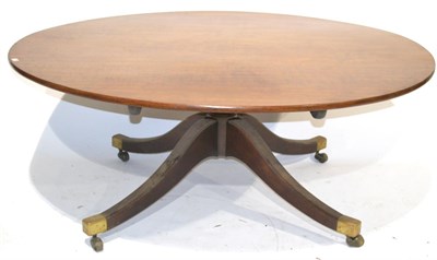 Lot 316 - A George III Design Dining Table, the oval flip-top above a turned gun barrel support on four...