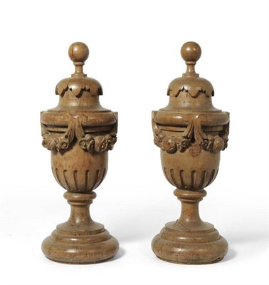 Lot 322 - A Pair of 19th Century Carved Pine Baroque Style Pedestal Urns, each carved with garlands of...