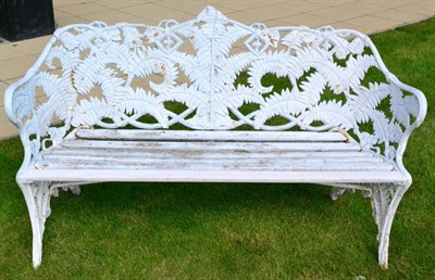 Lot 1052 - A Coalbrookdale Style Fern Pattern Garden Bench, 145cm wide, currently painted white