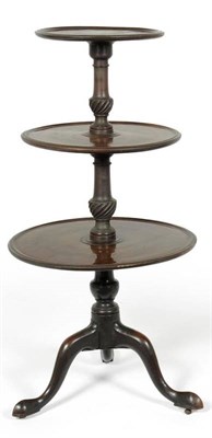 Lot 330 - A George III Mahogany Three-Tier Dumb Waiter, of circular graduated form with part-wrythen...