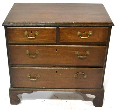 Lot 357 - A George III Mahogany and Pine Sided Straight Front Chest, late 18th century, the moulded top above