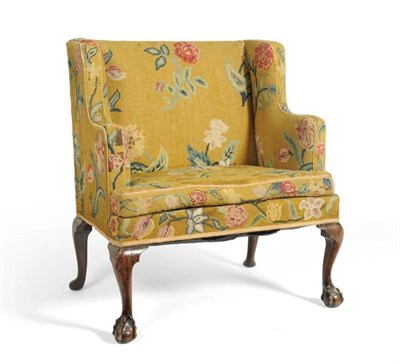 Lot 363 - A Wing Back Chair, of George III design, recovered in yellow and floral needlework fabric with...