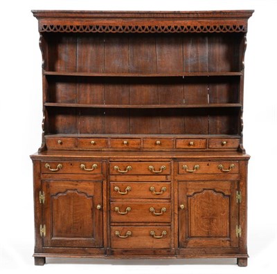 Lot 1082 - An 18th Century Oak Dresser, probably Shropshire/Staffordshire, the bold cornice above three...