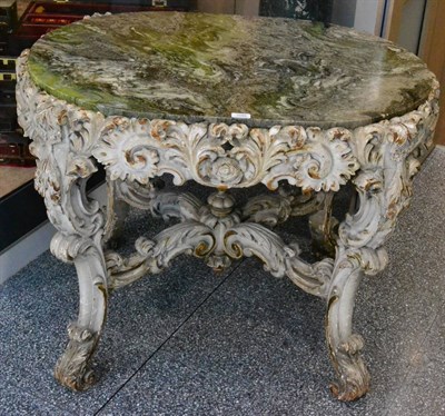 Lot 1089 - A Victorian Carved Pine Oval Centre Table, mid 19th century, painted en grisaille with a green...