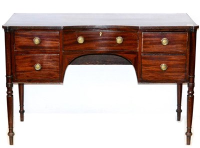 Lot 1091 - A Late Regency Mahogany and Ebony Strung Dressing Table, with reeded edge above an arrangement...