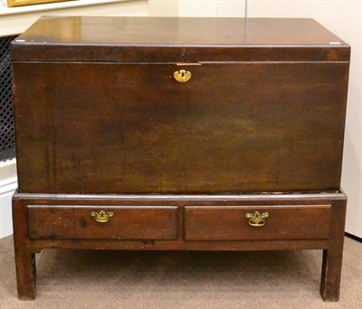 Lot 1105 - A George II Mahogany Chest on Stand, mid 18th century, with hinged lid and brass solid...