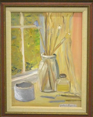 Lot 511 - American School (20th century) Still life of paintbrushes in a glass jar beside a window...