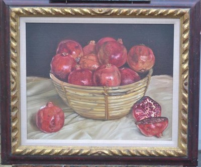 Lot 513 - Anthony Christian (b.1945)  Still life of pomegranates in a wicker basket Signed, and dated (19)81