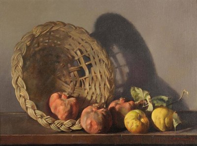 Lot 514 - Charles W Yeiser (20th century) American Still life of pomegranates, apples and a wicker basket...