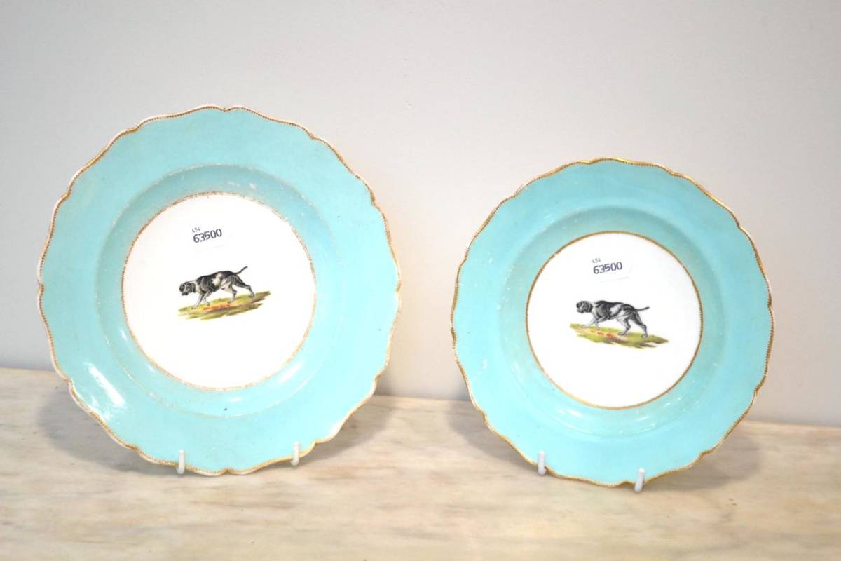 Lot 62 - A Pair of English Porcelain Plates circa 1810, painted with pointers in panels on a turquoise...