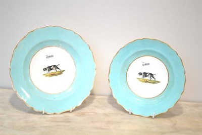 Lot 62A - A Pair of English Porcelain Plates circa 1810, painted with pointers in panels on a turquoise...
