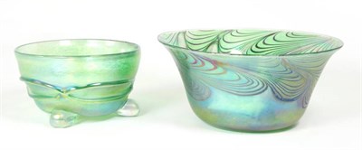 Lot 9 - John Ditchfield for Glasform; an iridescent green bowl decorated with feathered bands, etched...