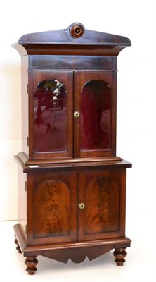 Lot 1117 - A Victorian Mahogany Miniature Bookcase or Table Cabinet, circa 1860, the upper section with a...