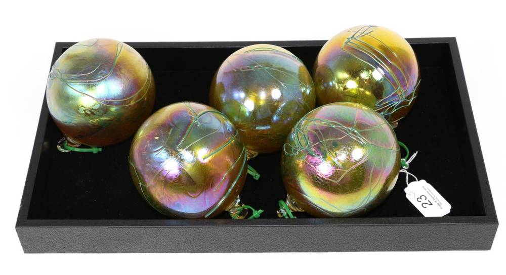 Lot 23 - John Ditchfield for Glasform; a set of five iridescent gold baubles decorated with surface...