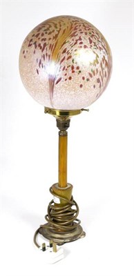 Lot 25 - John Ditchfield for Glasform; a brass and bakelite table lamp with iridescent pink globe form shade
