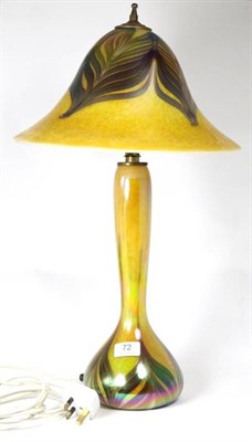 Lot 72 - John Ditchfield for Glasform; an iridescent gold table lamp decorated with iridescent petroleum...
