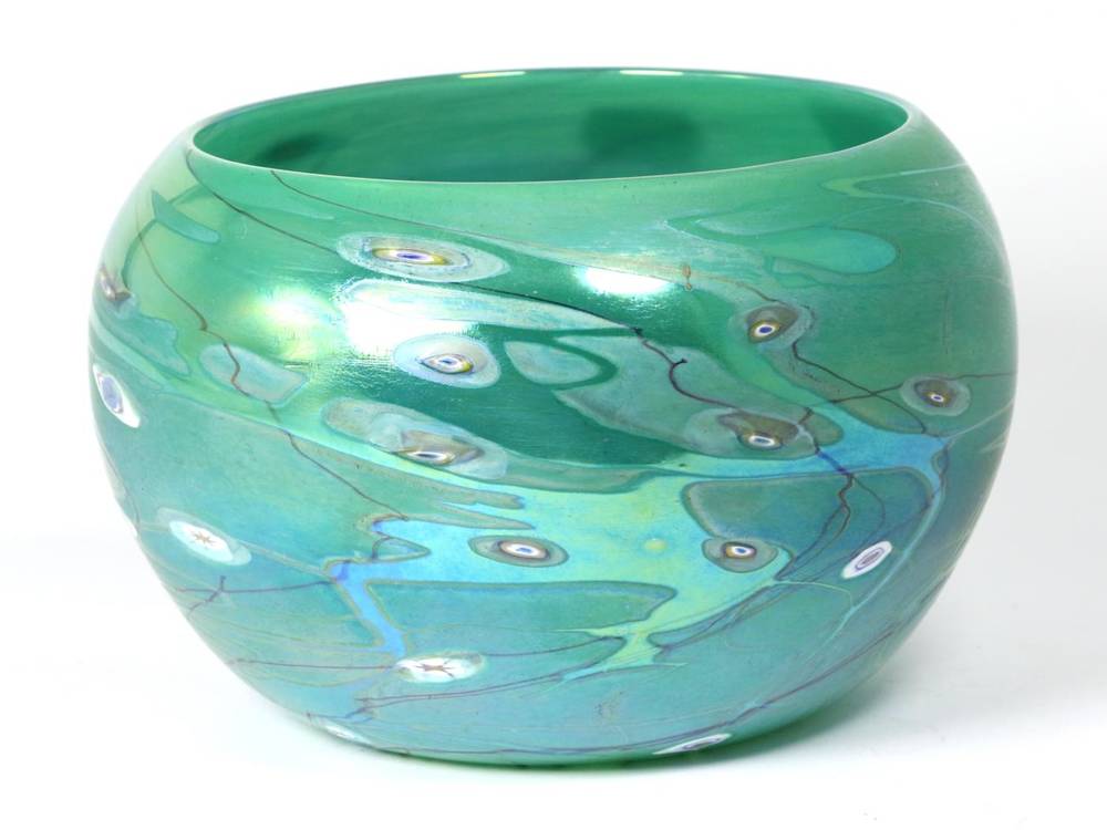 Lot 74 - John Ditchfield for Glasform; an iridescent green bowl decorated with millefiori and trails, etched