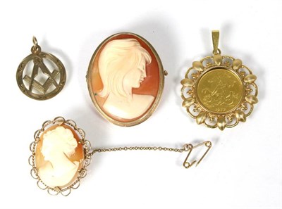 Lot 191 - A royal silver jubilee medallion in a fancy scroll frame, two 9 carat gold cameo brooches and a...