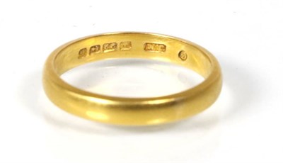 Lot 194 - A 22 carat gold band ring, finger size U1/2