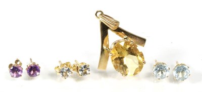 Lot 207 - A citrine pendant, an oval cut citrine within a V-shaped frame, stamped '9CT', a pair of...