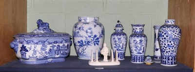 Lot 210 - Two near pairs of blue and white vases; another vase and cover; blue and white vase; Willow pattern